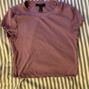 purple fitted top with lettuce hem